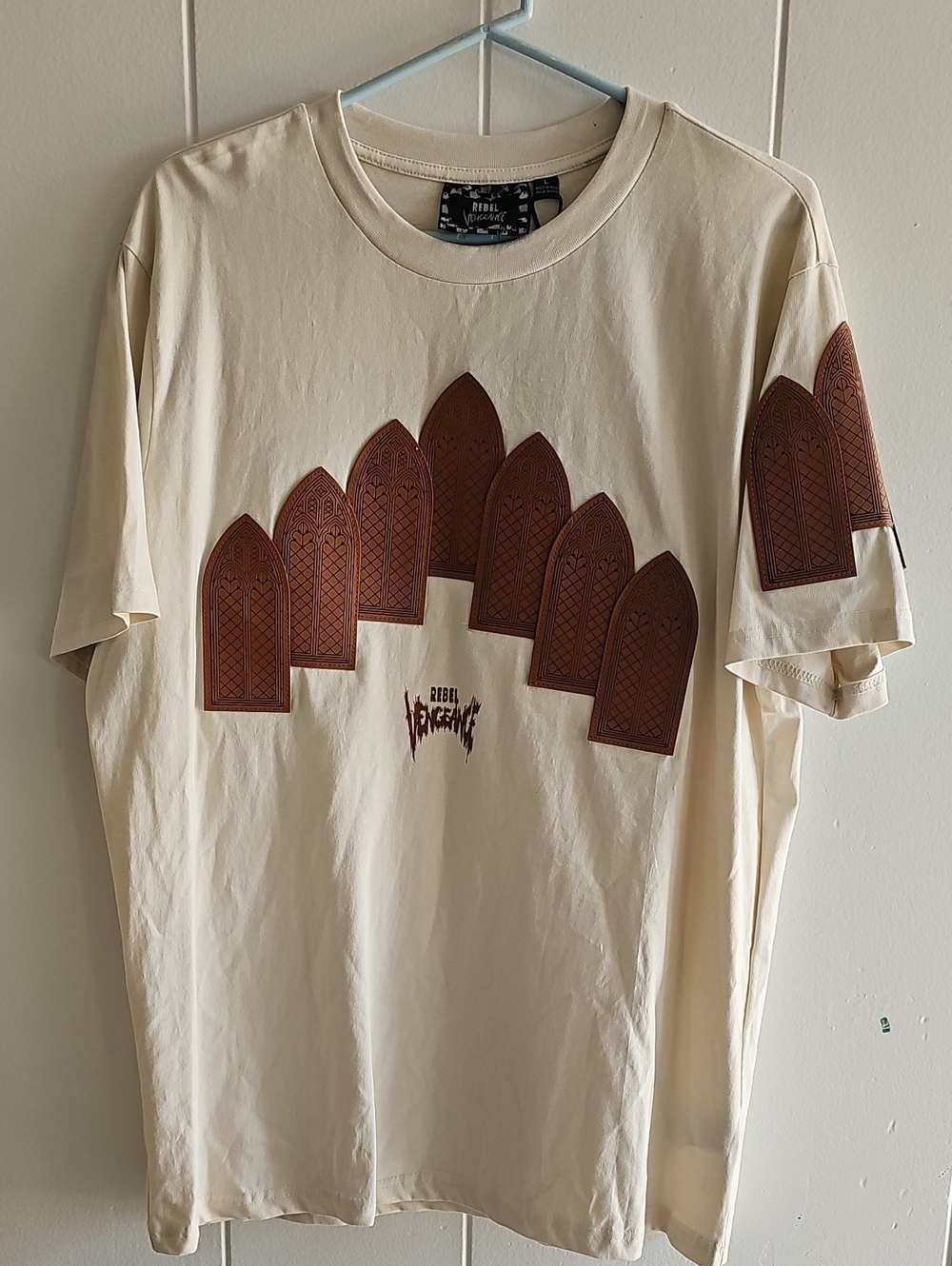 Rebel Vengeance Cream Short-Sleeve Tee with Brown Arch PanelsSize Large